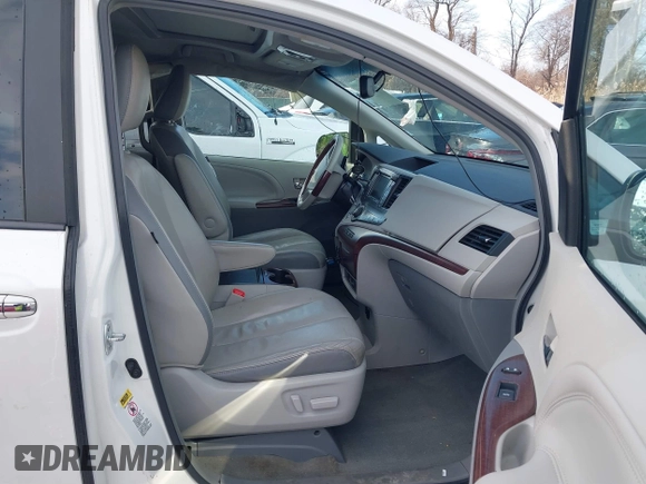 2013 Toyota Sienna XLE AAS with VIN 5TDYK3DC9DS380445, listed as a IAAI auction lot 41308312 with 174,325 mi miles and . Bid and sale history available at DreamBid. Image 5.
