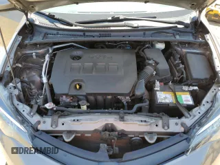 2018 Toyota Corolla L z VIN 2T1BURHE8JC097263, wystawiony jako Copart lot #57715595 z przebiegiem 78 598 mil mil oraz Szkoda całkowita • Salvage title. Historia ofert i sprzedaży dostępna na DreamBid. Obrazek 11.