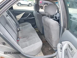 2001 Toyota Camry CE z VIN 4T1BG22K81U072844, wystawiony jako IAAI lot #42345527 z przebiegiem 152 059 mil mil oraz . Historia ofert i sprzedaży dostępna na DreamBid. Obrazek 8.