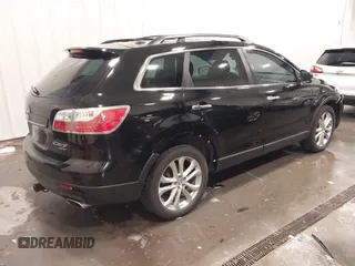2011 Mazda CX-9 Grand Touring z VIN JM3TB3DA8B0329437, wystawiony jako IAAI lot #42243017 z przebiegiem 250 572 mil mil oraz . Historia ofert i sprzedaży dostępna na DreamBid. Obrazek 4.
