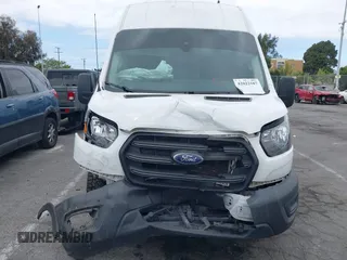 2020 Ford Transit Cargo with VIN 1FTBW3XG2LKB18281, listed as a IAAI auction lot 42022187 with 84,323 mi miles. Bid and sale history available at carsss.com. Image 12.