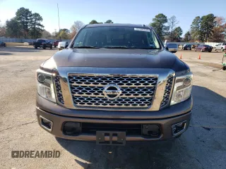 2017 Nissan Titan SL z VIN 1N6AA1E54HN512447, wystawiony jako Copart lot #85330734 z przebiegiem 119 424 mil mil oraz Czysty tytuł • Clean title. Historia ofert i sprzedaży dostępna na DreamBid. Obrazek 5.