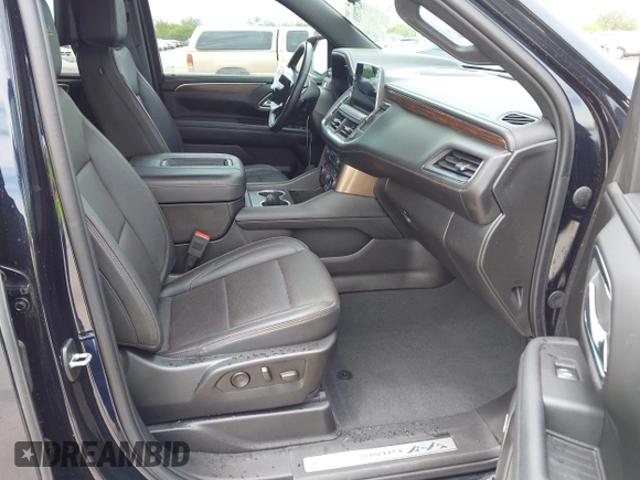 2023 Chevrolet Tahoe High Country with VIN 1GNSCTKT8PR215292, listed as a IAAI auction lot 42377531 with 32,525 mi miles and . Bid and sale history available at DreamBid. Image 5.