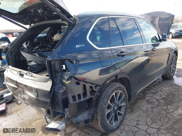 2018 BMW X5 xDrive40e iPerformance with VIN 5UXKT0C52J0W02406, listed as a IAAI auction lot 41449943 with 74,215 mi miles. Bid and sale history available at carsss.com. Image 4.
