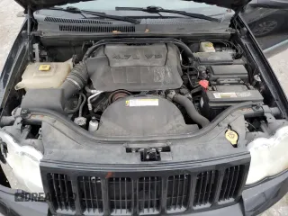 2009 Jeep Grand Cherokee Laredo with VIN 1J8HR48P19C514557, listed as a Copart auction lot 81830634 with 109,811 mi miles and Salvage Title. Bid and sale history available at carsss.com. Image 12.