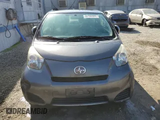 2014 Scion iQ with VIN JTNJJXB0XEJ029610, listed as a Copart auction lot 46700905 with 135,381 mi miles and Salvage Title. Bid and sale history available at carsss.com. Image 5.