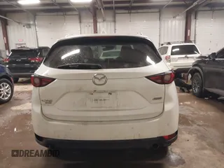 2019 Mazda CX-5 Signature with VIN JM3KFBEY5K0520593, listed as a IAAI auction lot 41638594 with 111,504 mi miles. Bid and sale history available at carsss.com. Image 16.