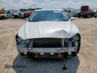2014 Ford Fusion SE Hybrid with VIN 3FA6P0LU1ER110489, listed as a Copart auction lot 58364095 with 112,605 mi miles and Salvage title. Bid and sale history available at DreamBid. Image 5.