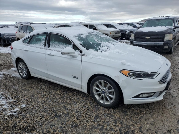 2017 Ford Fusion Energi SE with VIN 3FA6P0PU2HR110659, listed as a Copart auction lot 49099155 with 85,667 mi miles and Clean Title. Bid and sale history available at carsss.com. Image 4.