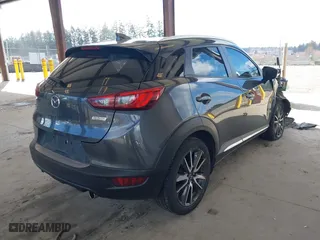 2017 Mazda CX-3 Grand Touring with VIN JM1DKFD70H0150496, listed as a IAAI auction lot 41746038 with 108,091 mi miles. Bid and sale history available at carsss.com. Image 4.