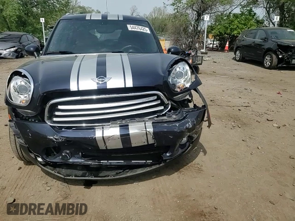 2014 MINI Countryman z VIN WMWZB3C55EWR42069, wystawiony jako Copart lot #54476425 z przebiegiem 42 218 mil mil oraz Szkoda całkowita • Salvage title. Historia ofert i sprzedaży dostępna na DreamBid. Obrazek 13.