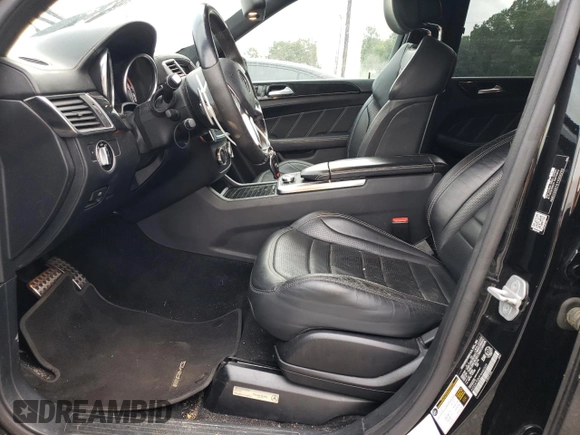 2015 Mercedes-Benz M 63 AMG with VIN 4JGDA7EB0FA440509, listed as a Copart auction lot 73954174 with 74,650 mi miles and Salvage Title. Bid and sale history available at carsss.com. Image 7.