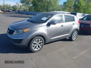 2016 Kia Sportage LX with VIN KNDPBCAC9G7840928, listed as a IAAI auction lot 42096987 with 211,548 mi miles and . Bid and sale history available at carsss.com. Image 2.