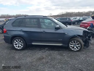 2011 BMW X5 35i with VIN 5UXZV4C59BL415034, listed as a IAAI auction lot 40969149 with 108,468 mi miles. Bid and sale history available at carsss.com. Image 13.