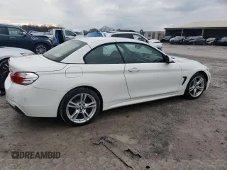 2015 BMW 4 Series 428i xDrive with VIN WBA3T1C52FP819767, listed as a Copart auction lot 82695004 with 71,648 mi miles and Salvage Title. Bid and sale history available at carsss.com. Image 3.
