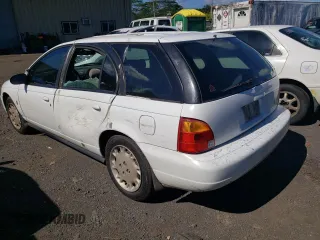 1997 Saturn SW z VIN 1G8ZK8276VZ205846, wystawiony jako Copart lot #82355564 z przebiegiem 178 543 mil mil oraz Szkody całkowita. Historia ofert i sprzedaży dostępna na DreamBid. Obrazek 2.