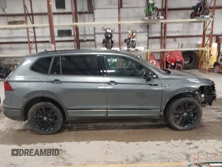2022 Volkswagen Tiguan SE R-Line Black with VIN 3VV8B7AX9NM103988, listed as a IAAI auction lot 41908814 with 43,671 mi miles and . Bid and sale history available at DreamBid. Image 14.