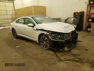 2019 Volkswagen Arteon SEL Premium R-Line z VIN WVWTR7AN6KE000595, wystawiony jako Copart lot #69872782 z przebiegiem 29 344 mil mil oraz . Historia ofert i sprzedaży dostępna na DreamBid. Obrazek 4.