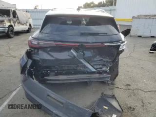 2023 Volkswagen ID.4 Pro with VIN 1V2VMPE80PC028390, listed as a Copart auction lot 48566185 with 74,329 mi miles and Salvage Title. Bid and sale history available at DreamBid. Image 6.