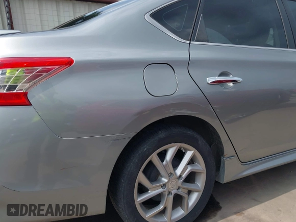 2013 Nissan Sentra SR z VIN 3N1AB7AP8DL696413, wystawiony jako IAAI lot #42116029 z przebiegiem 113 409 mil mil oraz . Historia ofert i sprzedaży dostępna na DreamBid. Obrazek 6.