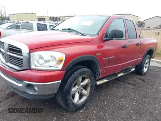 2007 Dodge 1500 SLT with VIN 1D7HU18217S189166, listed as a IAAI auction lot 42168002 with 264,304 mi miles. Bid and sale history available at carsss.com. Image 2.