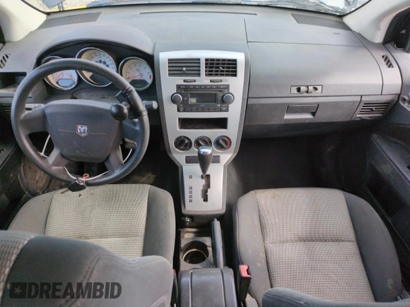 2008 Dodge Caliber SXT with VIN 1B3HB48B58D582130, listed as a Copart auction lot 49707155 with 155,347 mi miles and Salvage Title. Bid and sale history available at DreamBid. Image 8.