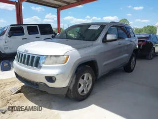 2011 Jeep Grand Cherokee Laredo with VIN 1J4RR4GG3BC540655, listed as a IAAI auction lot 42158522 with 214,341 mi miles and . Bid and sale history available at DreamBid. Image 2.