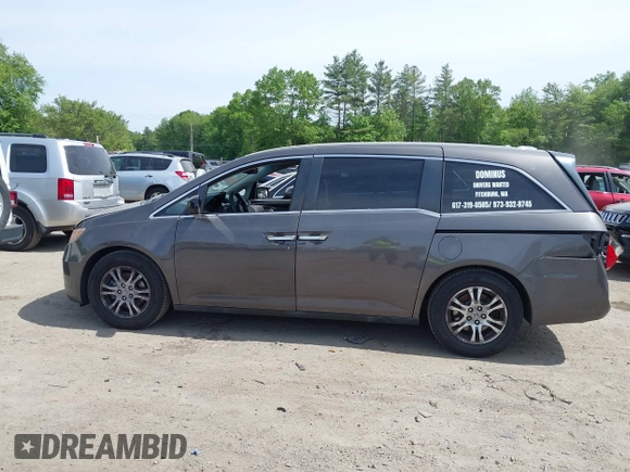 2012 Honda Odyssey EX-L with VIN 5FNRL5H63CB037697, listed as a IAAI auction lot 42262596 with 135,218 mi miles and . Bid and sale history available at DreamBid. Image 14.