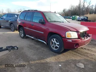 2008 GMC Envoy SLE2 with VIN 1GKDT13S682120370, listed as a IAAI auction lot 41653263 with 214,739 mi miles. Bid and sale history available at carsss.com. Image 1.