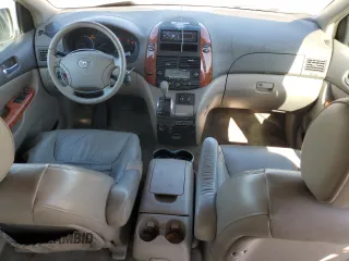 2006 Toyota Sienna XLE z VIN 5TDBA22C56S068681, wystawiony jako Copart lot #52547885 z przebiegiem 202 390 mil mil oraz Szkoda całkowita • Salvage title. Historia ofert i sprzedaży dostępna na DreamBid. Obrazek 8.