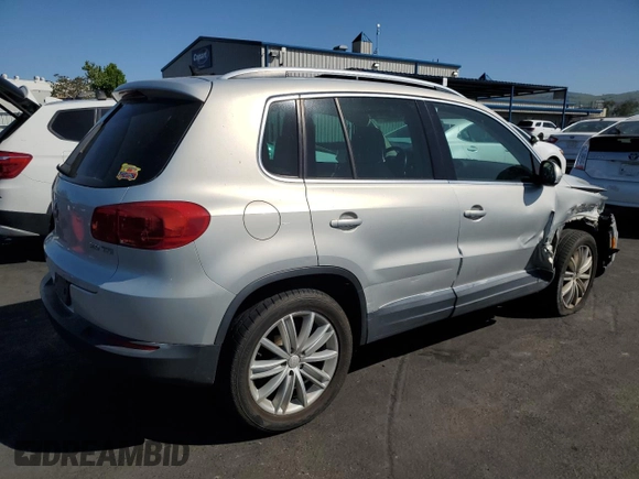2012 Volkswagen Tiguan SEL with VIN WVGAV7AXXCW521394, listed as a Copart auction lot 53000555 with 126,017 mi miles and Salvage Title. Bid and sale history available at DreamBid. Image 3.
