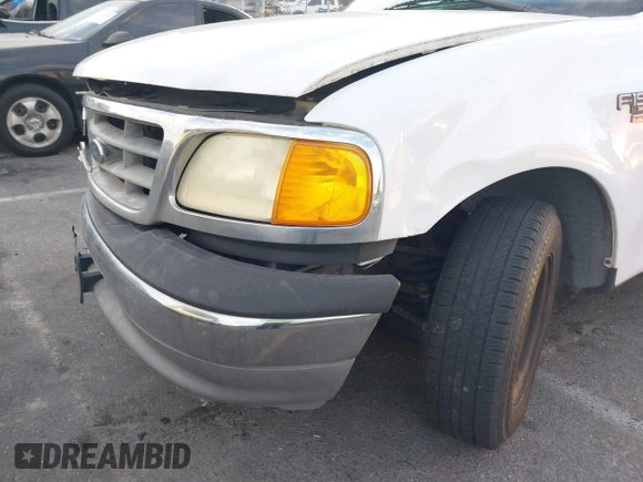 2004 Ford F-150 XL with VIN 2FTRX17W84CA43289, listed as a IAAI auction lot 41248462 with Not provided miles and . Bid and sale history available at DreamBid. Image 13.