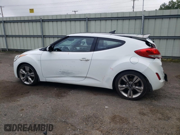 2013 Hyundai Veloster w/Gray Int с VIN KMHTC6AD3DU164555, выставлен на аукционе Copart как лот 54487605 с пробегом 146 134 миль миль и Списание • Salvage title. История ставок и продаж доступна на DreamBid. Изображение 2.
