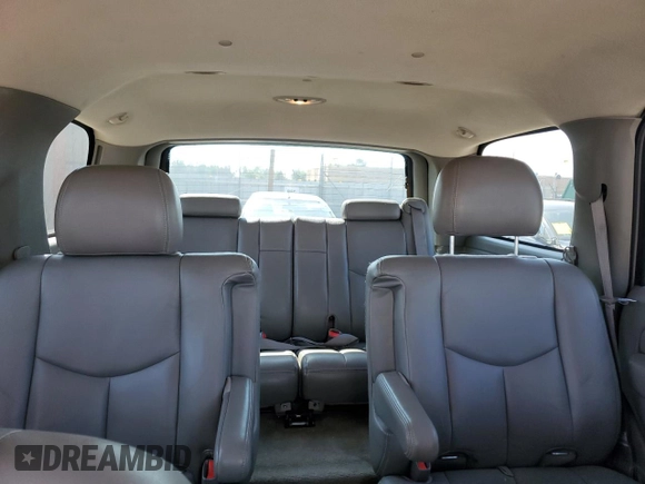 2004 GMC Yukon SLT with VIN 1GKEK13Z34J235318, listed as a Copart auction lot 74971334 with 189,771 mi miles and Salvage Title. Bid and sale history available at carsss.com. Image 10.