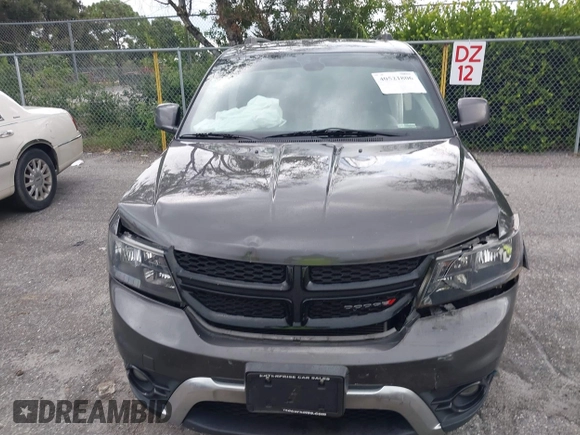 2020 Dodge Journey Crossroad with VIN 3C4PDCGB0LT270042, listed as a IAAI auction lot 40521806 with 102,934 mi miles and . Bid and sale history available at carsss.com. Image 12.