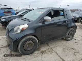 2014 Scion iQ with VIN JTNJJXB04EJ029974, listed as a Copart auction lot 48307365 with 102,901 mi miles and Salvage Title. Bid and sale history available at carsss.com. Image 1.