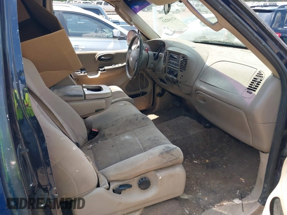 2002 Ford F-150 XL with VIN 1FTRX17W12NC06310, listed as a IAAI auction lot 42160213 with Not provided miles and . Bid and sale history available at DreamBid. Image 5.