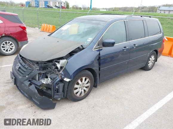 2009 Honda Odyssey EX-L with VIN 5FNRL38769B409281, listed as a IAAI auction lot 42013137 with 213,934 mi miles and . Bid and sale history available at DreamBid. Image 2.