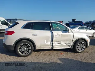 2016 Lincoln MKX Reserve with VIN 2LMTJ6LR4GBL75275, listed as a IAAI auction lot 41936550 with 76,177 mi miles. Bid and sale history available at carsss.com. Image 13.