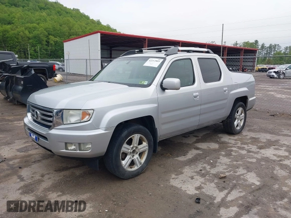 2012 Honda Ridgeline RTL with VIN 5FPYK1F58CB454385, listed as a IAAI auction lot 42212805 with 207,874 mi miles and . Bid and sale history available at DreamBid. Image 17.