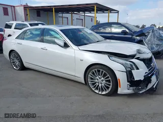 2016 Cadillac CT6 Luxury AWD with VIN 1G6KD5RSXGU154557, listed as a IAAI auction lot 41550199 with 102,536 mi miles. Bid and sale history available at carsss.com. Image 1.