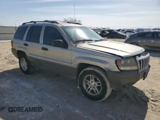 2003 Jeep Grand Cherokee Laredo with VIN 1J4GX48S43C516026, listed as a Copart auction lot 45264525 with 113,222 mi miles and Salvage Title. Bid and sale history available at carsss.com. Image 4.