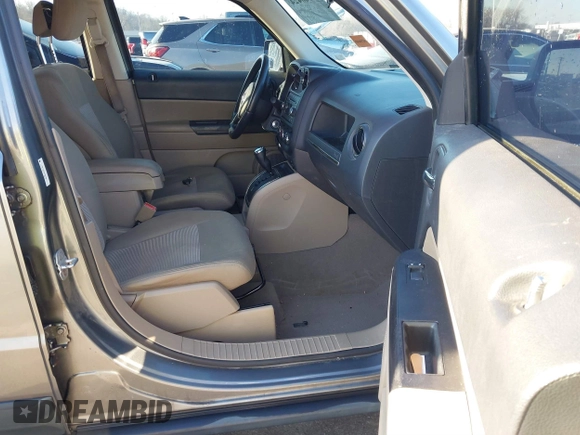 2011 Jeep Patriot Sport with VIN 1J4NT1GA1BD220156, listed as a IAAI auction lot 41760424 with 100,336 mi miles and . Bid and sale history available at carsss.com. Image 5.