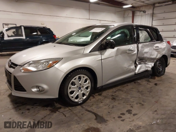 2012 Ford Focus SE z VIN 1FAHP3F21CL463704, wystawiony jako IAAI lot #42246436 z przebiegiem 234 474 mil mil oraz . Historia ofert i sprzedaży dostępna na DreamBid. Obrazek 19.