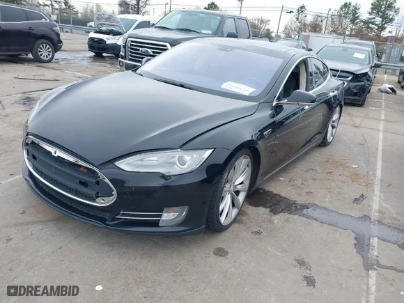 2013 Tesla Model S Performance with VIN 5YJSA1DP0DFP13202, listed as a IAAI auction lot 41746432 with 47,002 mi miles. Bid and sale history available at carsss.com. Image 2.