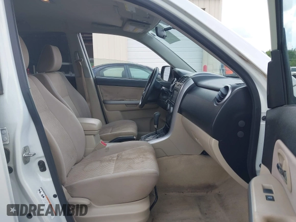 2013 Suzuki Grand Vitara Premium with VIN JS3TE0D68D4100201, listed as a IAAI auction lot 42694457 with 126,585 mi miles and . Bid and sale history available at DreamBid. Image 5.