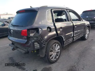 2016 Volkswagen Tiguan S with VIN WVGBV7AX5GW568438, listed as a IAAI auction lot 41434616 with 91,341 mi miles and . Bid and sale history available at DreamBid. Image 4.