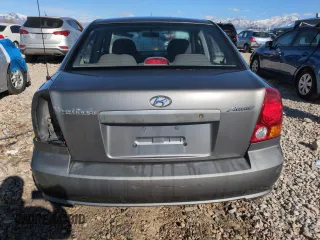 2004 Hyundai Accent GL with VIN KMHCG45C94U523529, listed as a Copart auction lot 50016085 with 188,120 mi miles and Salvage Title. Bid and sale history available at carsss.com. Image 6.