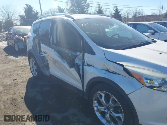 2016 Ford Escape Titanium with VIN 1FMCU9J96GUB65441, listed as a IAAI auction lot 41412223 with 74,218 mi miles. Bid and sale history available at carsss.com. Image 6.
