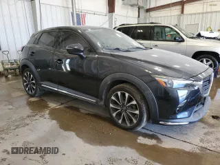 2019 Mazda CX-3 Grand Touring z VIN JM1DKDD72K1401203, wystawiony jako Copart lot #56408335 z przebiegiem 62 923 mil mil oraz Szkody całkowita. Historia ofert i sprzedaży dostępna na DreamBid. Obrazek 4.